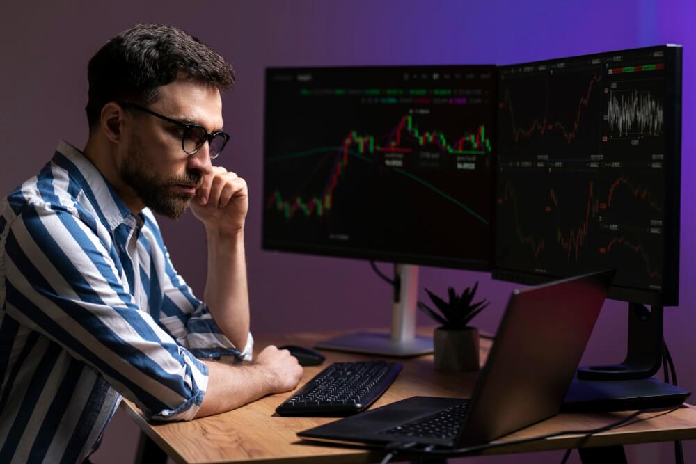 FX trader pensive